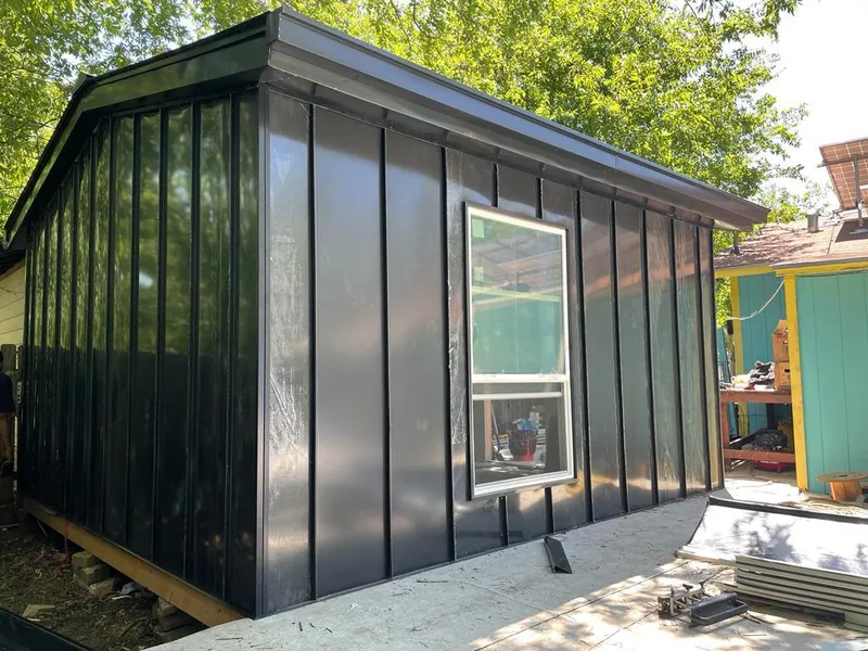 Black standing seam metal wall panels for Roof Inspection in Glens Falls