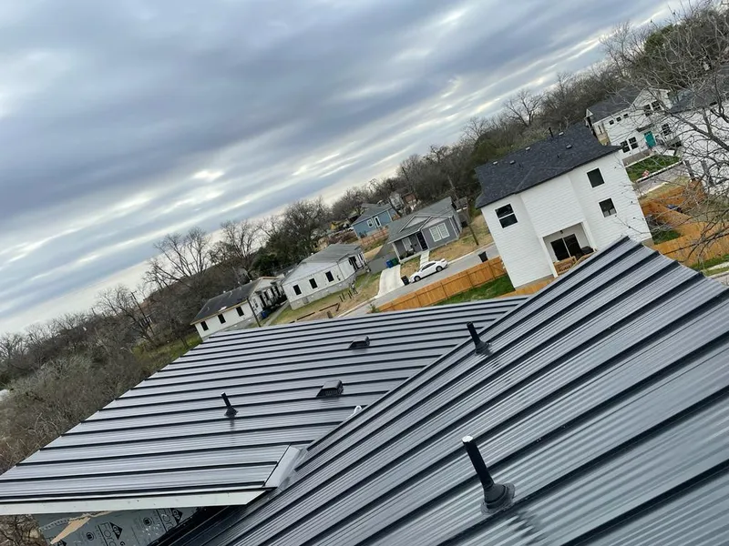 Standing seam metal roof panels with vents for Skylight Repair in Glens Falls